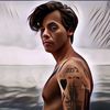 Harga Jual Syal Bulu Jadi Makin Melejit Gegara Penampilan Harry Styles di Grammy Awards 2021