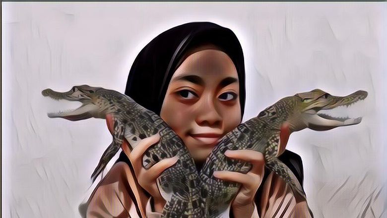 Foto Cewek Cantik Ini Mematahkan Mitos Kalau Ukhtie Takut Ama Buaya