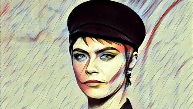 Seksinya Cara Delevingne Pamer Perut Rata