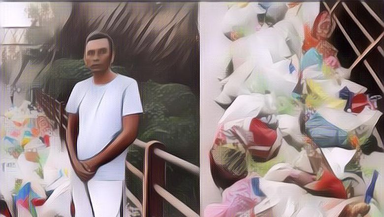 Menginspirasi Banget, Pria Ini Rela Berdiri Seharian di Jembatan Supaya Gak Ada yang Buang Sampah ke Sungai!