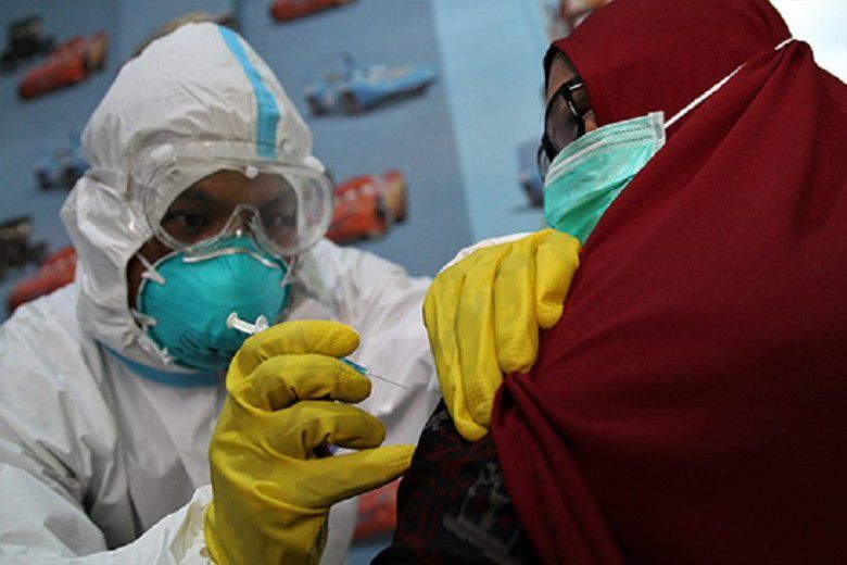 Berpartisipasi dalam Vaksinasi