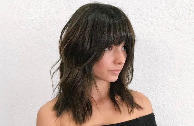 4. Short Hair Layering with Bangs