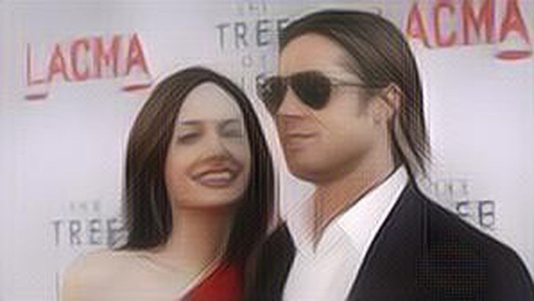 Wajah Angelina Jolie Jadi Sorotan Setelah Beri Tanda Tangan di Poster Brad Pitt